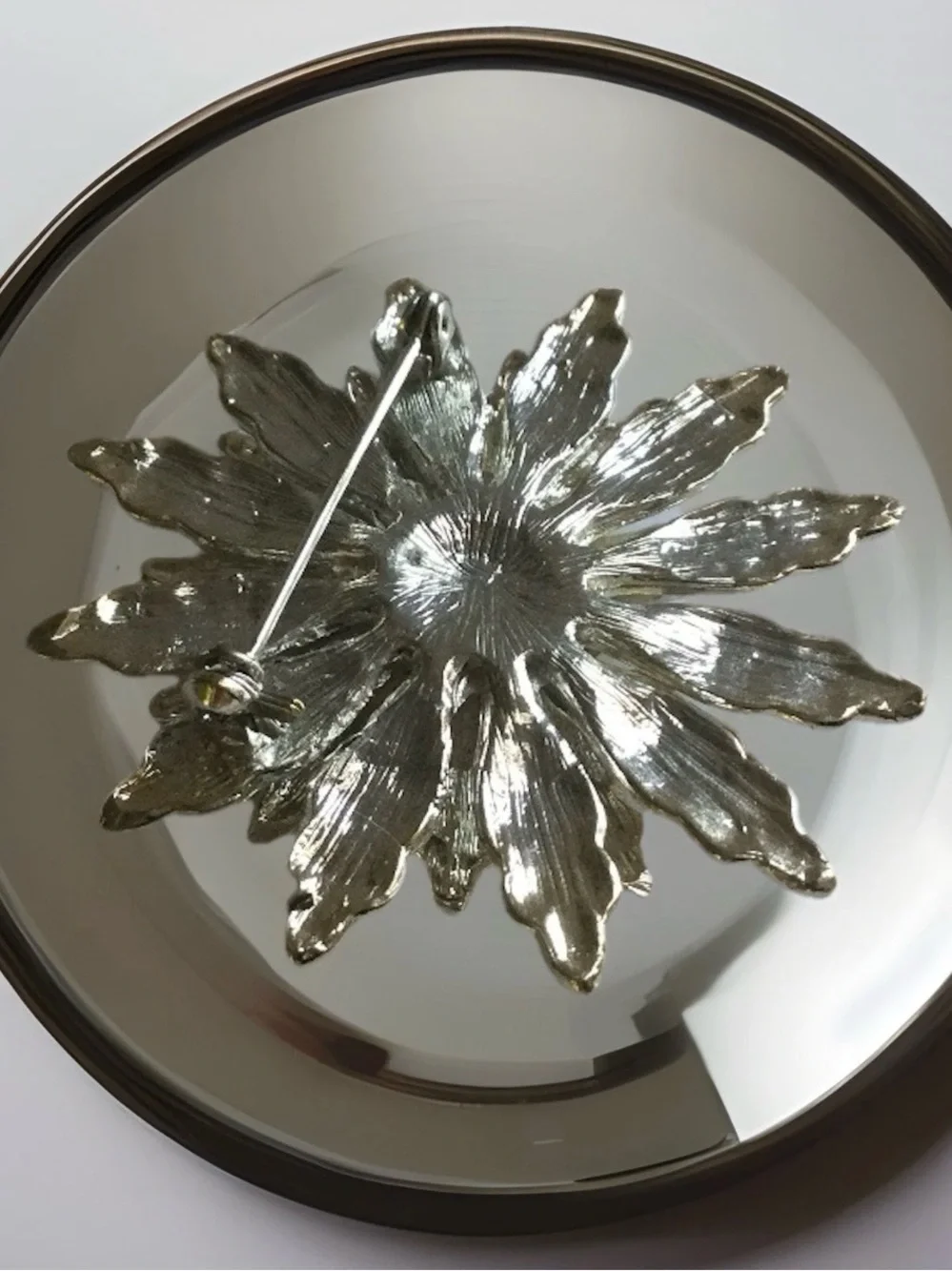 Vintage Silver and White Snowflake Brooch with Crystal Centers